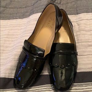 Naturalizer “Kilty” black patent leather shoes.